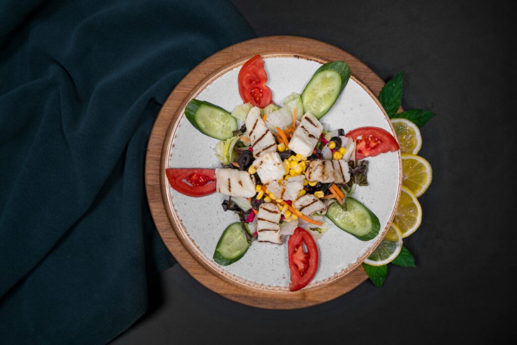 a plate of food on a wooden surface